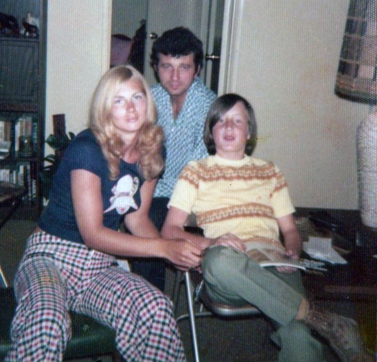 A softly faded 1974 color family snapshot before and after a careful AI restoration