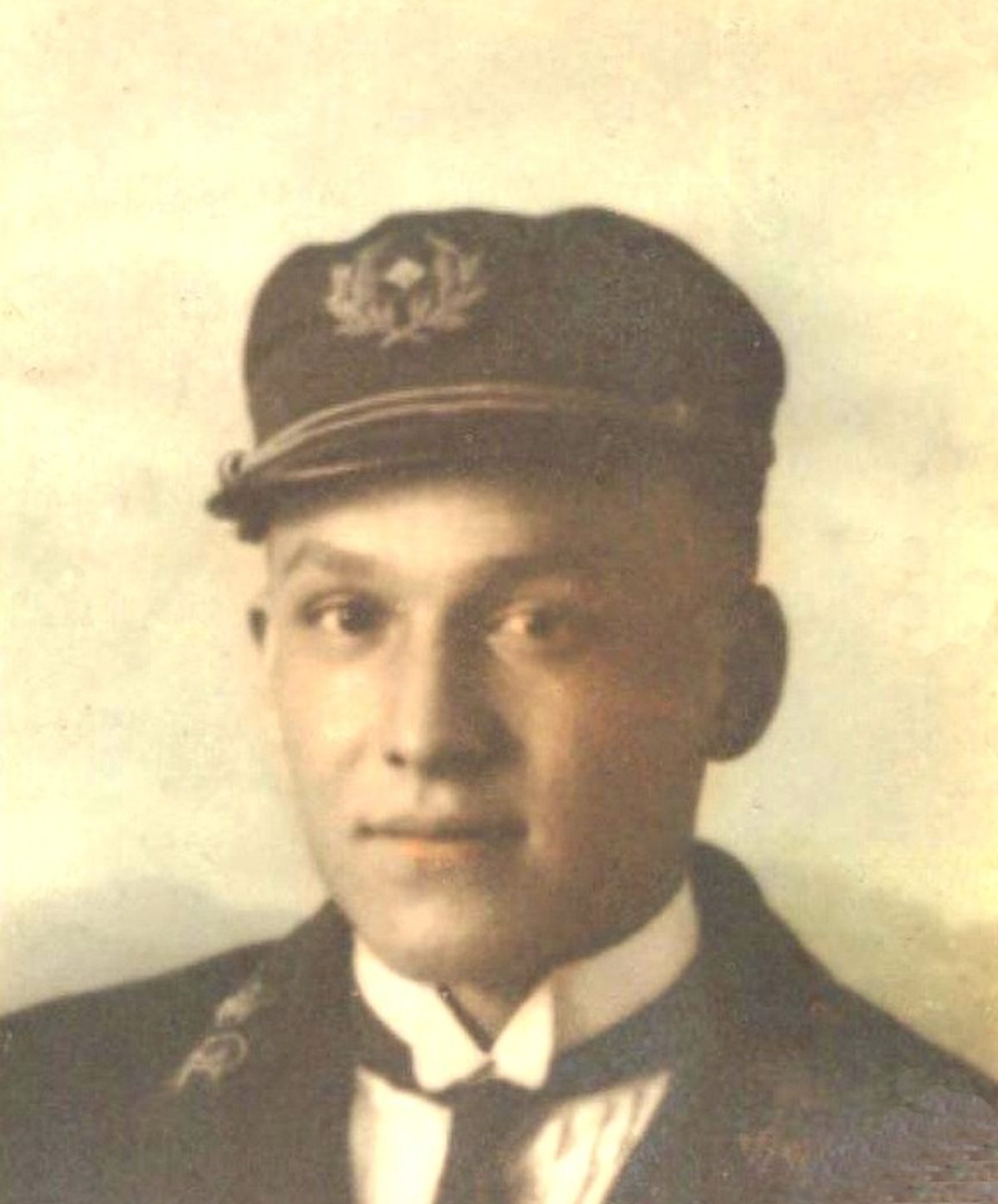 Before: 1925 portrait — yellowing and sun-fading corrected